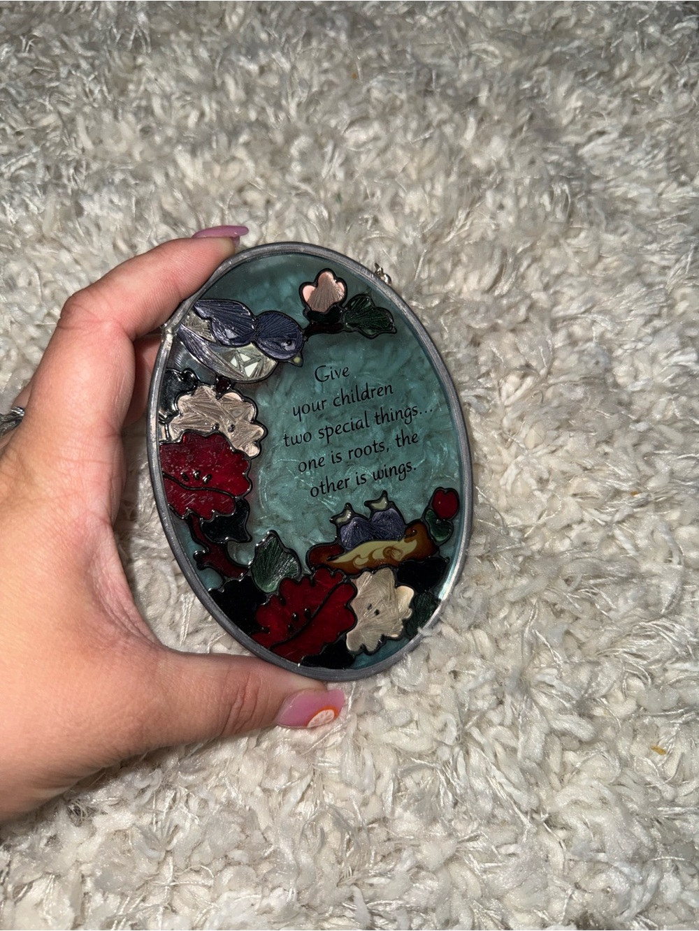 Stained glass suncatcher with the words 'Give your children two special things..
